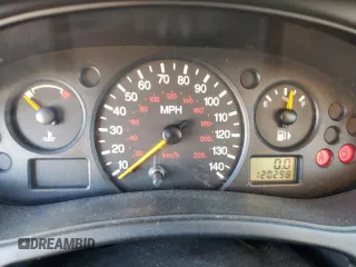 2000 Ford Focus LX with VIN 1FAFP33P8YW216936, listed as a Copart auction lot 83038404 with 120,298 mi miles and Salvage Title. Bid and sale history available at DreamBid. Image 9.