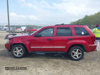 2005 Jeep Grand Cherokee Laredo with VIN 1J4HS48N95C711992, listed as a IAAI auction lot 41944696 with 209,299 mi miles and . Bid and sale history available at DreamBid. Image 14.