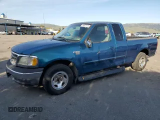 2000 Ford F-150 XL with VIN 1FTRX17W9YKB14999, listed as a Copart auction lot 48827915 with 130,775 mi miles and Salvage Title. Bid and sale history available at carsss.com. Image 1.
