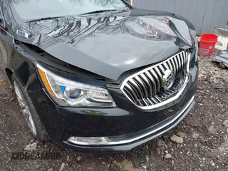 2014 Buick LaCrosse Premium II with VIN 1G4GF5G39EF172201, listed as a IAAI auction lot 41963281 with 106,231 mi miles and . Bid and sale history available at DreamBid. Image 6.