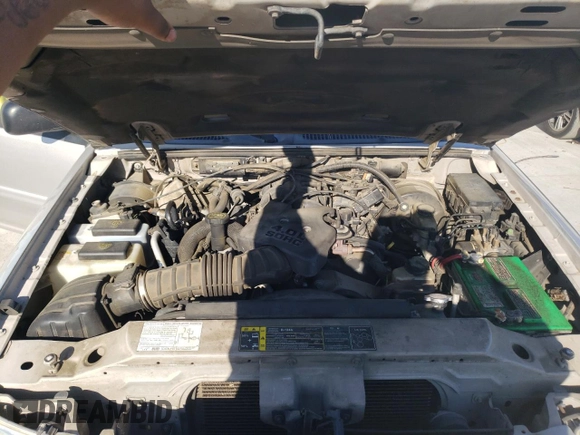2004 Ford Explorer Sport Trac XLS with VIN 1FMZU67K24UB65144, listed as a Copart auction lot 52611305 with 211,806 mi miles and Salvage title. Bid and sale history available at DreamBid. Image 11.