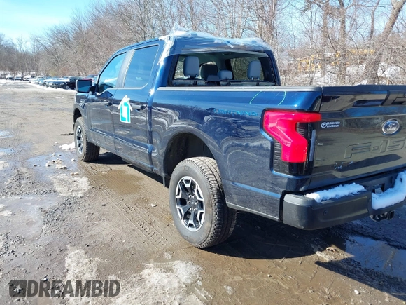 2023 Ford F-150 Lightning Pro with VIN 1FTVW1EL7PWG07081, listed as a IAAI auction lot 38702102 with 9,976 mi miles and . Bid and sale history available at DreamBid. Image 3.