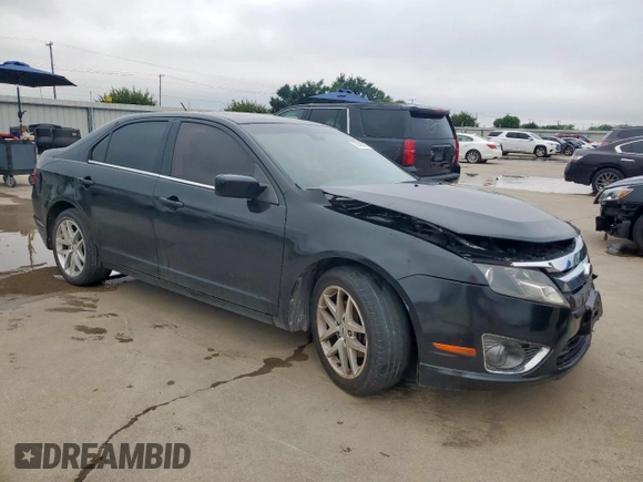 2012 Ford Fusion SEL z VIN 3FAHP0JGXCR426220, wystawiony jako Copart lot #59346985 z przebiegiem 151 397 mil mil oraz Szkoda całkowita • Salvage title. Historia ofert i sprzedaży dostępna na DreamBid. Obrazek 4.
