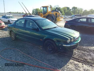 2006 Jaguar X-Type with VIN SAJWA51A46WE99813, listed as a IAAI auction lot 42011197 with 215,839 mi miles and . Bid and sale history available at DreamBid. Image 1.