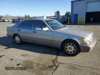 1995 Mercedes-Benz S with VIN WDBGA51E4SA202452, listed as a Copart auction lot 42133385 with 165,561 mi miles and Clean Title. Bid and sale history available at DreamBid. Image 4.