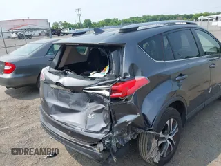 2017 Toyota RAV4 LE with VIN JTMBFREV6HD205665, listed as a IAAI auction lot 42436639 with 217,744 mi miles and . Bid and sale history available at DreamBid. Image 6.