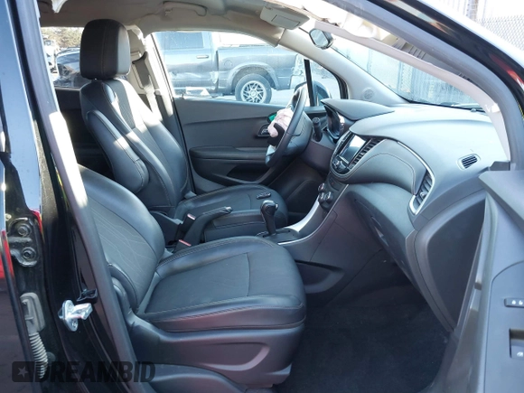 2021 Chevrolet Trax LT with VIN KL7CJPSB9MB342992, listed as a IAAI auction lot 41667044 with 52,289 mi miles. Bid and sale history available at carsss.com. Image 5.