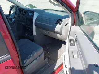 2009 Dodge Grand Caravan SE with VIN 2D8HN44E39R647787, listed as a IAAI auction lot 42609366 with 100,878 mi miles and . Bid and sale history available at DreamBid. Image 5.