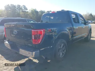 2021 Ford F-150 XL with VIN 1FTEW1EP9MFC67009, listed as a IAAI auction lot 41895221 with 55,417 mi miles. Bid and sale history available at carsss.com. Image 4.