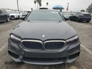 2019 BMW 5 Series M550i xDrive with VIN WBAJB9C59KB287501, listed as a Copart auction lot 59732425 with 74,345 mi miles and Salvage title. Bid and sale history available at DreamBid. Image 5.