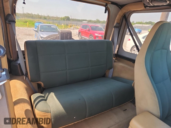 1997 Jeep Wrangler Sahara with VIN 1J4FY49S3VP519387, listed as a Copart auction lot 63822395 with 187,884 mi miles and Salvage title. Bid and sale history available at DreamBid. Image 11.