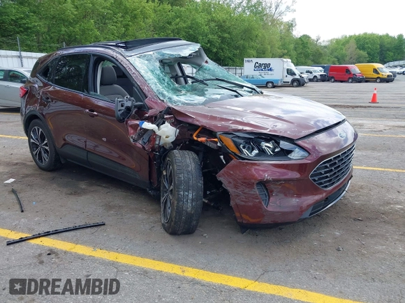 2021 Ford Escape SE Hybrid with VIN 1FMCU9BZ9MUA15592, listed as a IAAI auction lot 42261312 with 56,525 mi miles and . Bid and sale history available at DreamBid. Image 1.
