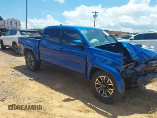 2018 Toyota Tacoma SR with VIN 3TMCZ5ANXJM143529, listed as a IAAI auction lot 42740828 with 127,049 mi miles and . Bid and sale history available at DreamBid. Image 1.