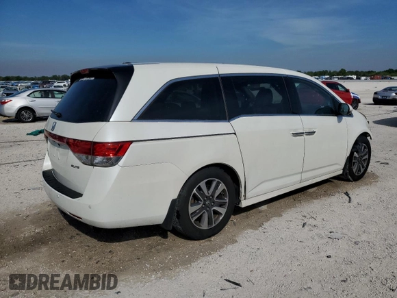 2014 Honda Odyssey Touring with VIN 5FNRL5H98EB059790, listed as a Copart auction lot 50547555 with Not Provided miles and Salvage Title. Bid and sale history available at DreamBid. Image 3.