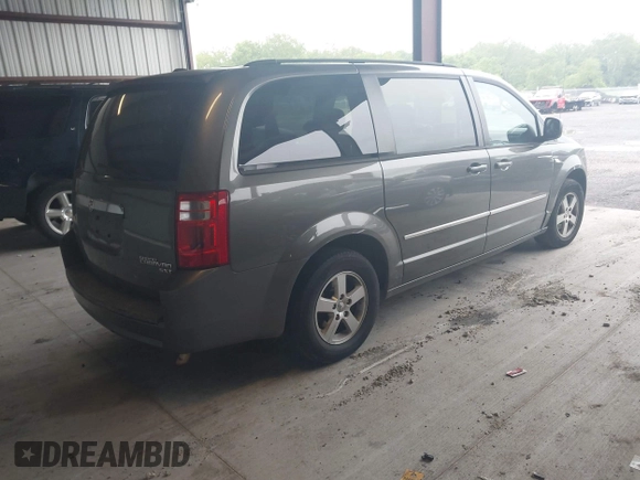 2010 Dodge Grand Caravan SXT z VIN 2D4RN5D11AR220105, wystawiony jako IAAI lot #42299610 z przebiegiem 223 842 mil mil oraz . Historia ofert i sprzedaży dostępna na DreamBid. Obrazek 4.