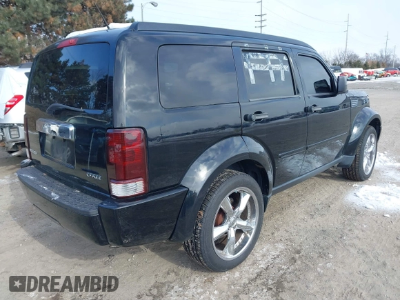 2007 Dodge Nitro SLT with VIN 1D8GU58K97W583862, listed as a IAAI auction lot 41378801 with 227,713 mi miles. Bid and sale history available at carsss.com. Image 4.