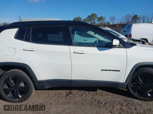 2020 Jeep Compass Latitude with VIN 3C4NJDBB9LT139639, listed as a IAAI auction lot 41695315 with 64,927 mi miles and . Bid and sale history available at DreamBid. Image 13.