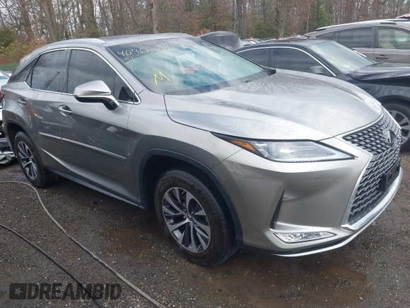 2022 Lexus RX with VIN 2T2HZMDA5NC326016, listed as a IAAI auction lot 40966492 with 22,633 mi miles. Bid and sale history available at carsss.com. Image 1.