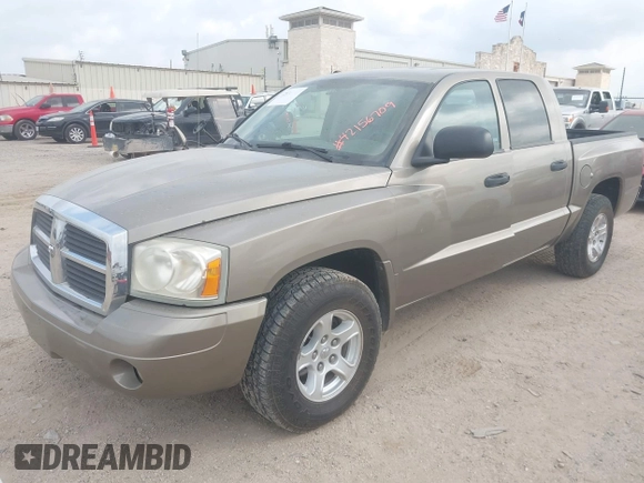 2006 Dodge Dakota SLT with VIN 1D7HE48N16S703072, listed as a IAAI auction lot 42156709 with 102,919 mi miles. Bid and sale history available at carsss.com. Image 2.