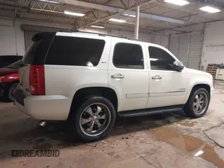 2009 GMC Yukon SLT w/4SB with VIN 1GKFC33069R299683, listed as a IAAI auction lot 41453259 with 182,415 mi miles. Bid and sale history available at carsss.com. Image 14.