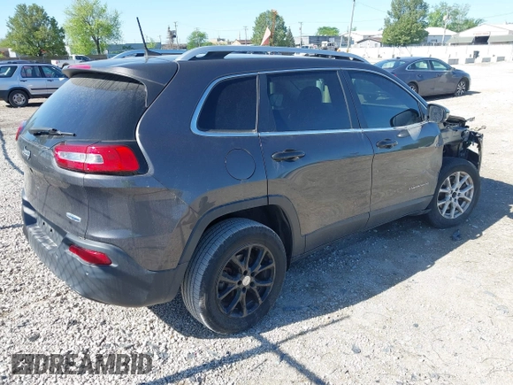 2016 Jeep Cherokee Latitude z VIN 1C4PJLCB5GW264607, wystawiony jako IAAI lot #42275637 z przebiegiem 64 264 mil mil oraz . Historia ofert i sprzedaży dostępna na DreamBid. Obrazek 4.
