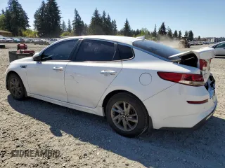 2019 Kia Optima LX z VIN 5XXGT4L36KG362239, wystawiony jako Copart lot #55698295 z przebiegiem 93 651 mil mil oraz Czysty tytuł • Clean title. Historia ofert i sprzedaży dostępna na DreamBid. Obrazek 2.