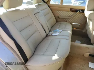 1990 Mercedes-Benz 420 with VIN WDBCA35E3LA500747, listed as a Copart auction lot 74351004 with 132,480 mi miles and Clean Title. Bid and sale history available at carsss.com. Image 10.