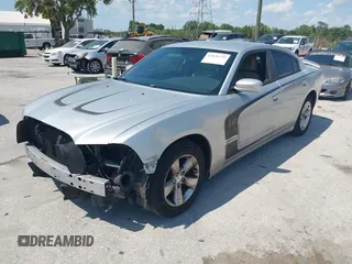 2012 Dodge Charger SE with VIN 2C3CDXBG5CH119493, listed as a IAAI auction lot 42126739 with 138,464 mi miles and . Bid and sale history available at carsss.com. Image 18.