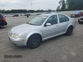 2004 Volkswagen Jetta GL with VIN 3VWRR69M34M108439, listed as a Copart auction lot 74029704 with 296,984 mi miles and Salvage title. Bid and sale history available at DreamBid. Image 1.