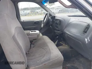 1999 Ford F-150 с VIN 1FTRX18W2XNB30523, выставлен на аукционе IAAI как лот 41617531 с пробегом 319 673 миль миль и . История ставок и продаж доступна на DreamBid. Изображение 5.