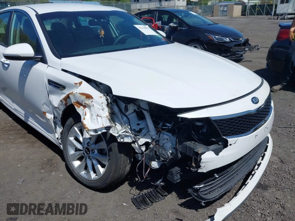 2018 Kia Optima LX with VIN 5XXGT4L31JG261091, listed as a IAAI auction lot 42168652 with 68,070 mi miles. Bid and sale history available at carsss.com. Image 6.