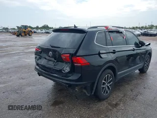 2021 Volkswagen Tiguan SE z VIN 3VV3B7AX7MM004286, wystawiony jako IAAI lot #39864219 z przebiegiem 67 429 mil mil oraz . Historia ofert i sprzedaży dostępna na DreamBid. Obrazek 4.