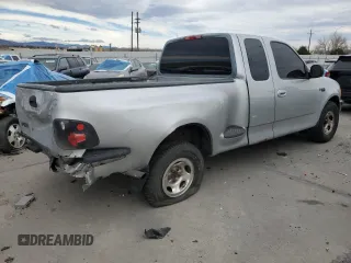 1998 Ford F-150 with VIN 2FTZX0729WCA50004, listed as a Copart auction lot 50028895 with 291,952 mi miles and Salvage title. Bid and sale history available at DreamBid. Image 3.