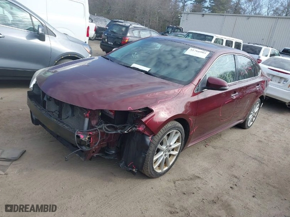 2013 Toyota Avalon XLE with VIN 4T1BK1EBXDU070666, listed as a IAAI auction lot 41766905 with 115,904 mi miles. Bid and sale history available at carsss.com. Image 2.