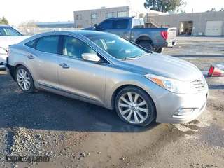 2013 Hyundai Azera with VIN KMHFH4JG3DA230844, listed as a IAAI auction lot 41817997 with 129,163 mi miles. Bid and sale history available at carsss.com. Image 1.