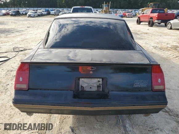 1987 Chevrolet Monte Carlo z VIN 1G1GZ11G0HP115148, wystawiony jako Copart lot #75645874 z przebiegiem 86 744 mil mil oraz Nie do naprawy. Historia ofert i sprzedaży dostępna na DreamBid. Obrazek 6.