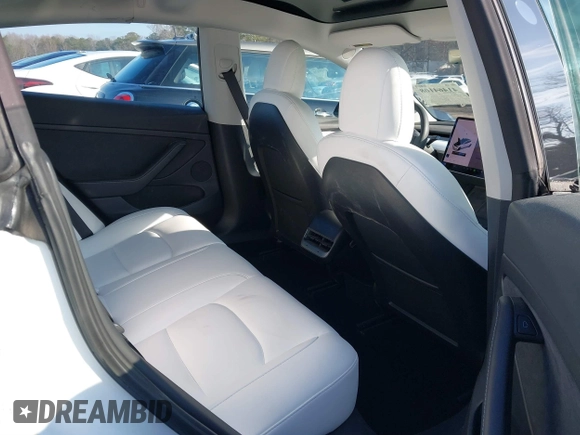 2021 Tesla Model 3 Long Range with VIN 5YJ3E1EB1MF056759, listed as a IAAI auction lot 41464108 with 48,694 mi miles and . Bid and sale history available at carsss.com. Image 8.