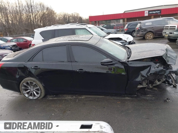 2017 Cadillac CTS Luxury AWD with VIN 1G6AX5SS4H0135377, listed as a IAAI auction lot 41442999 with 86,804 mi miles and . Bid and sale history available at DreamBid. Image 13.