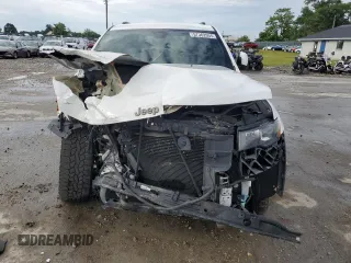 2017 Jeep Grand Cherokee 75th Anniversary with VIN 1C4RJEAG3HC696232, listed as a Copart auction lot 57362055 with 105,440 mi miles and Salvage title. Bid and sale history available at DreamBid. Image 5.