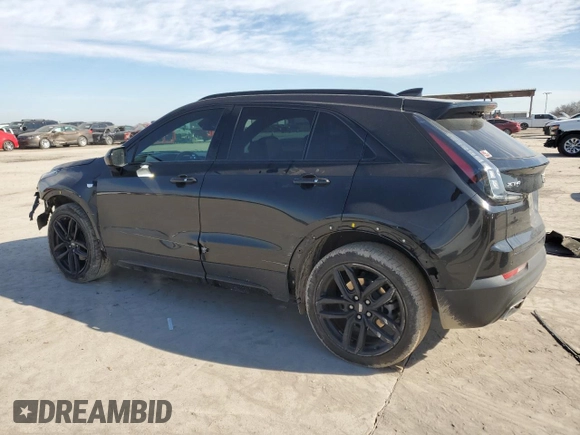 2020 Cadillac XT4 FWD Sport with VIN 1GYFZER49LF024652, listed as a Copart auction lot 46231255 with 87,567 mi miles and Salvage title. Bid and sale history available at DreamBid. Image 2.