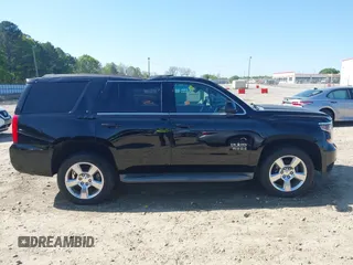 2015 Chevrolet Tahoe LT with VIN 1GNSCBKC8FR268891, listed as a IAAI auction lot 41964602 with 175,035 mi miles and . Bid and sale history available at DreamBid. Image 13.