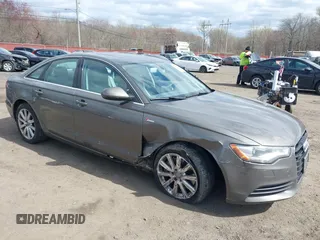 2013 Audi A6 Premium Plus z VIN WAUGGAFC1DN038375, wystawiony jako IAAI lot #42051929 z przebiegiem 118 181 mil mil oraz . Historia ofert i sprzedaży dostępna na DreamBid. Obrazek 6.