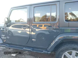 2017 Jeep Wrangler Unlimited Sahara with VIN 1C4BJWEGXHL686766, listed as a IAAI auction lot 41305319 with 97,806 mi miles. Bid and sale history available at carsss.com. Image 14.