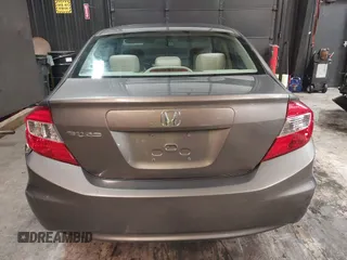 2012 Honda Civic LX z VIN 19XFB2F59CE373830, wystawiony jako IAAI lot #42312118 z przebiegiem 106 541 mil mil oraz . Historia ofert i sprzedaży dostępna na DreamBid. Obrazek 16.
