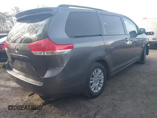 2011 Toyota Sienna XLE AAS with VIN 5TDYK3DC2BS093980, listed as a IAAI auction lot 42064568 with 196,893 mi miles. Bid and sale history available at carsss.com. Image 4.