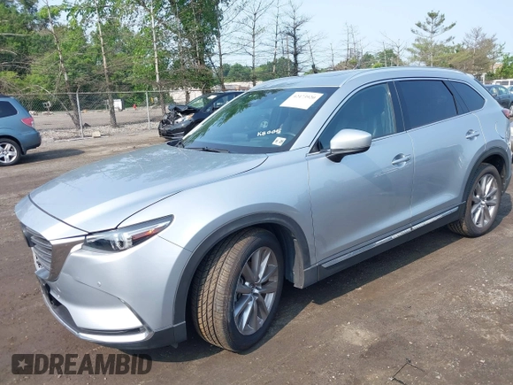 2020 Mazda CX-9 Grand Touring with VIN JM3TCBDY6L0424584, listed as a IAAI auction lot 42473920 with 32,385 mi miles and . Bid and sale history available at DreamBid. Image 2.