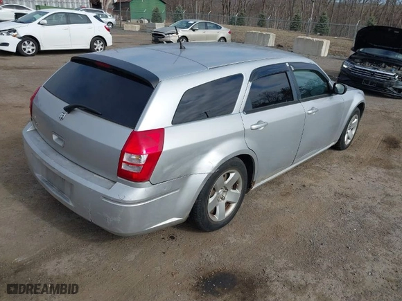 2008 Dodge Magnum with VIN 2D4FV47TX8H104329, listed as a IAAI auction lot 41801975 with 94,679 mi miles. Bid and sale history available at carsss.com. Image 4.