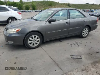 2003 Toyota Camry LE z VIN 4T1BF30K63U549981, wystawiony jako Copart lot #59293475 z przebiegiem 170 806 mil mil oraz Szkoda całkowita • Salvage title. Historia ofert i sprzedaży dostępna na DreamBid. Obrazek 1.