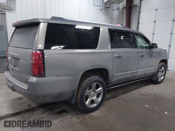 2018 Chevrolet Suburban Premier z VIN 1GNSKJKC9JR100134, wystawiony jako IAAI lot #41449255 z przebiegiem 111 528 mil mil oraz . Historia ofert i sprzedaży dostępna na DreamBid. Obrazek 4.