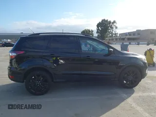 2017 Ford Escape SE with VIN 1FMCU0GDXHUC95845, listed as a IAAI auction lot 41850265 with 77,691 mi miles and . Bid and sale history available at carsss.com. Image 13.